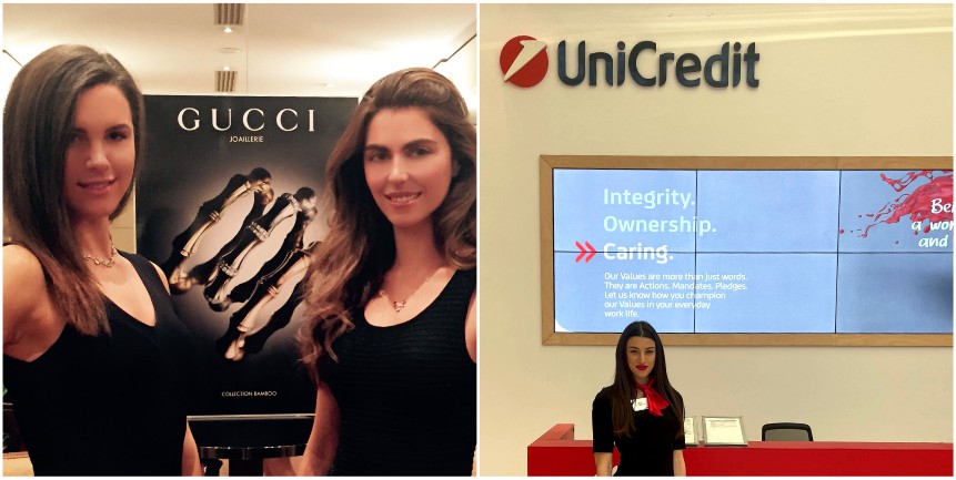 Hostess in nero allo stand Gucci e, accanto, hostess all’evento UniCredit davanti agli schermi con la scritta &ldquo;Integrity, Ownership, Caring&rdquo;